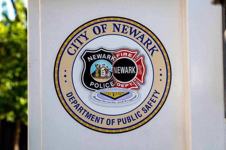 Logos for the Newark police and fire departments